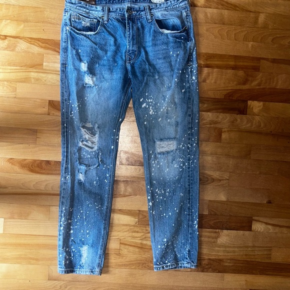 Distressed Blue Jeans - Picture 1 of 3